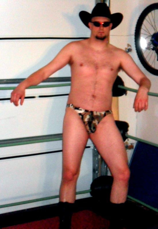 a goatee cowboy wrestler wearing camoflage jockstrap.jpg