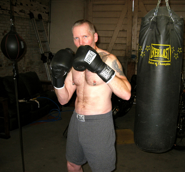masculine gay boxing man workingout gym.jpg