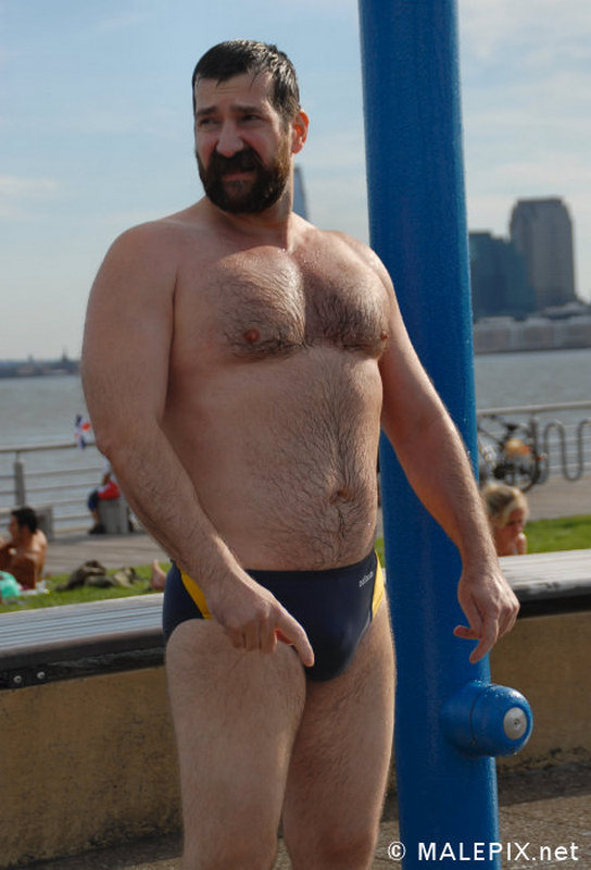 man at beach shirtless wet hairychest glistening muscles.jpg