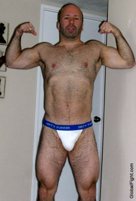 trimmed chest musclejock flexing arms gay wrestlers pics.jpg