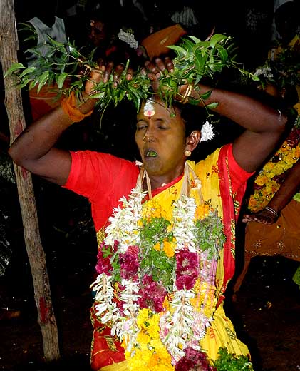 Woman in a trance at Mulaipari festival at Koovathupatti Tamil Nadu. http://www.blurb.com/books/3782738