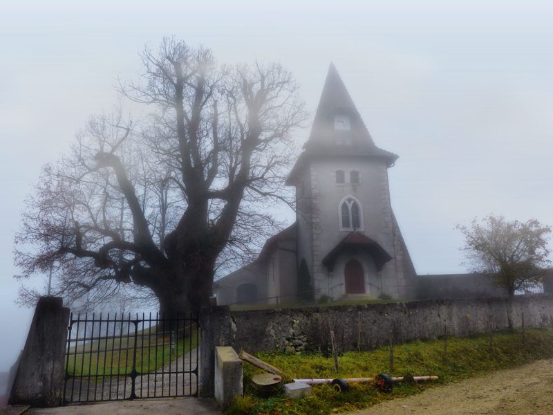 The old little church in the fog