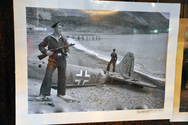 Historic Photograph - Soviet Sailor with a shot down German plane, 1943