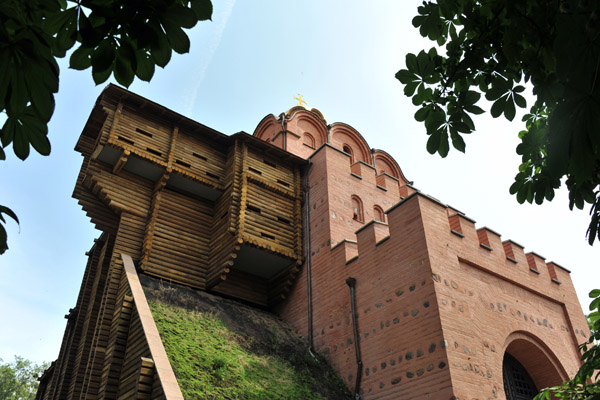 Golden Gate of Kiev with a combination of brickwork and rough logs