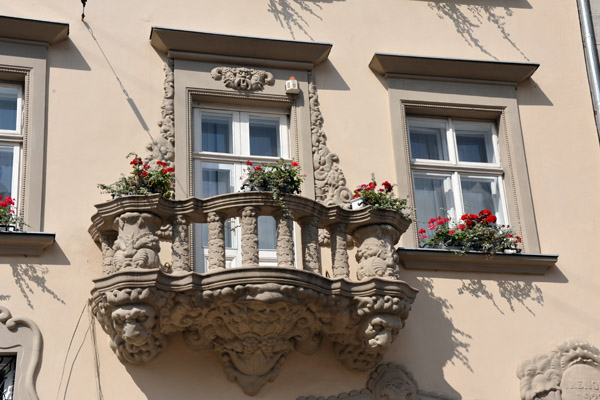 Ornate carved balcony, Rynok Square 31, Lviv