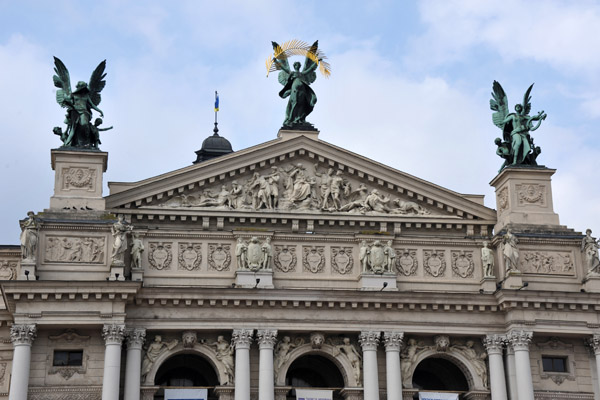 Bronze statues of Glory, Poetry and Music on top of the Lviv Opera Theatre