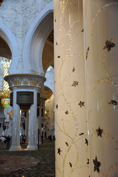 Column with inlaid flower mosaics