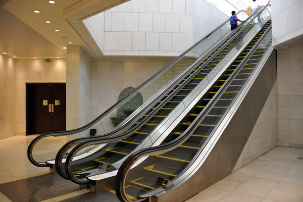 Escalator from the main level to the basement ablution facitilities