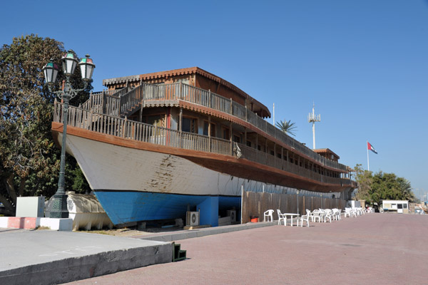 Al Safinah Restaurant - an old boat across from the Marina Mall