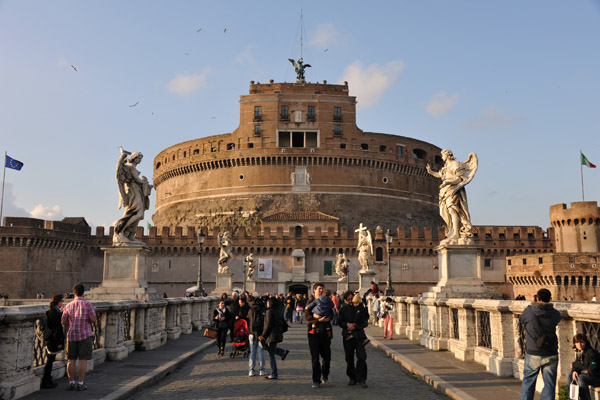 Walking across the Ponte Sant'Angelo over the Tiber River