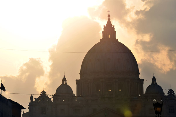Late afternoon sun behind the Vatican