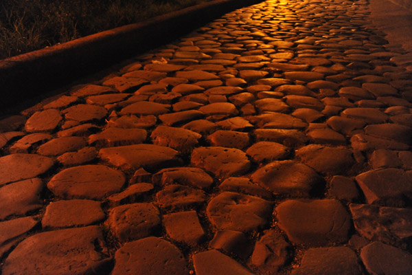 Roman road at night