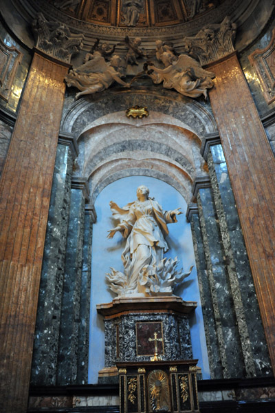 St. Agnes amid the fires of temptation by Ercole Ferrata (1686)