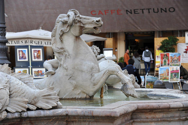 The basin of the Neptune Fountain is contemporaneous with the Moor Fountain and is also by Giacomo Della Porta