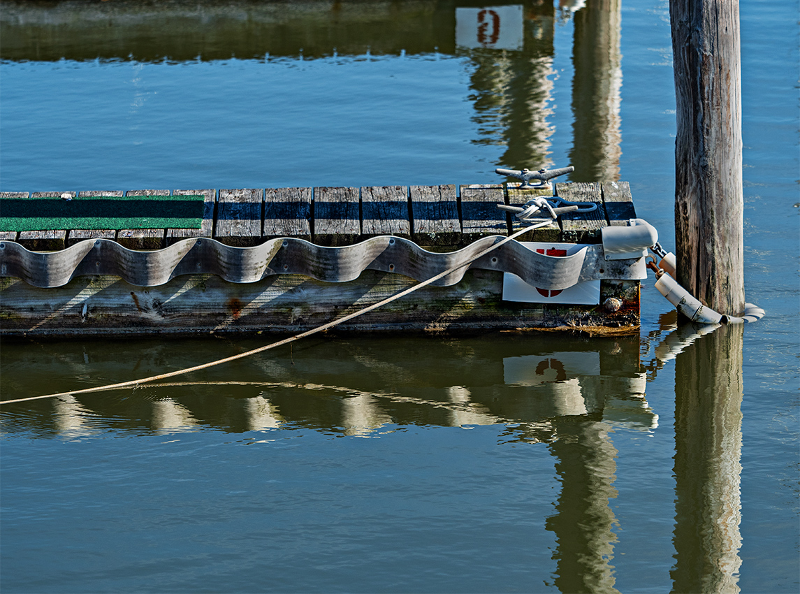 reflections at the marina