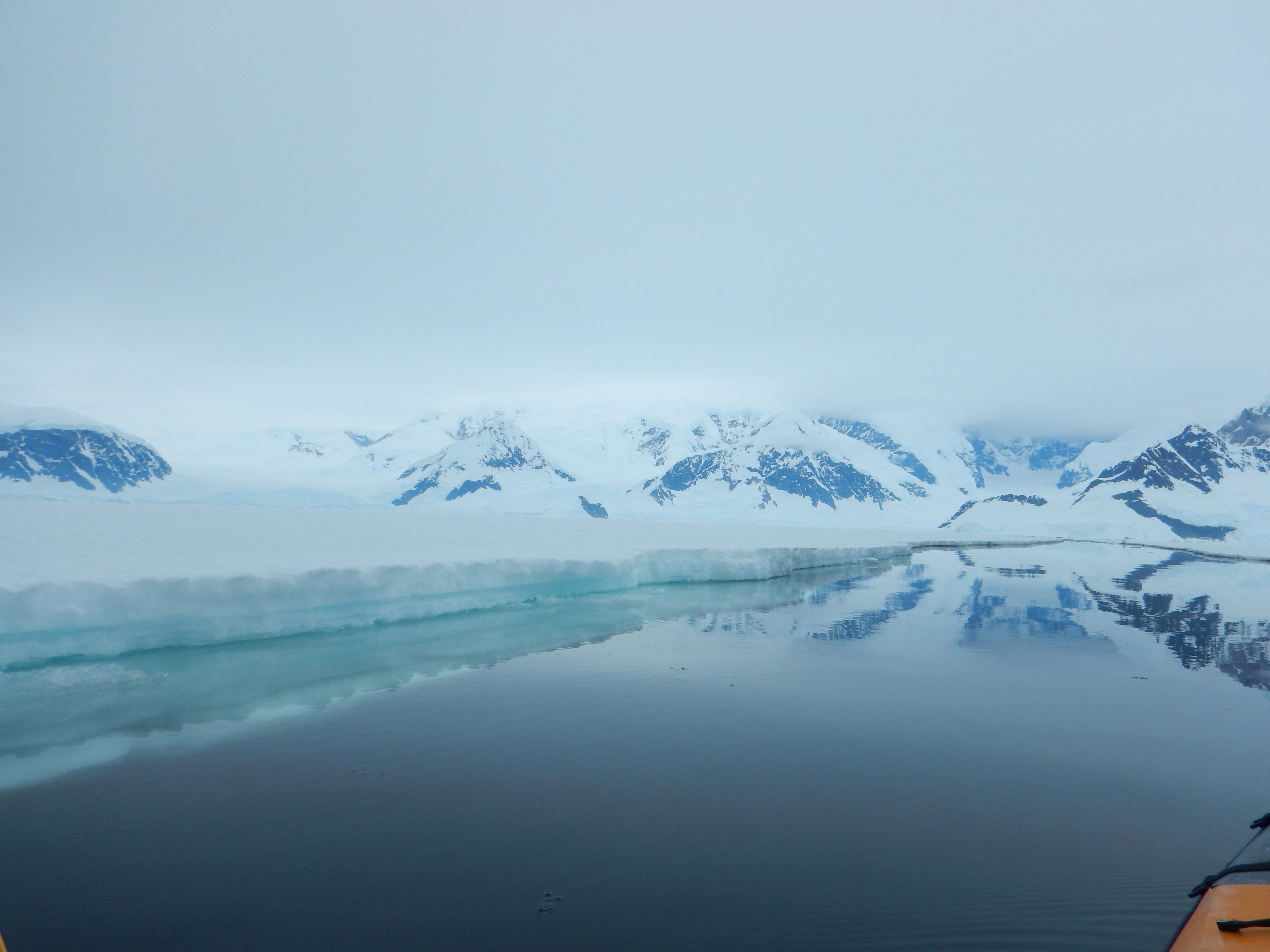 Kayaking between the sea ice