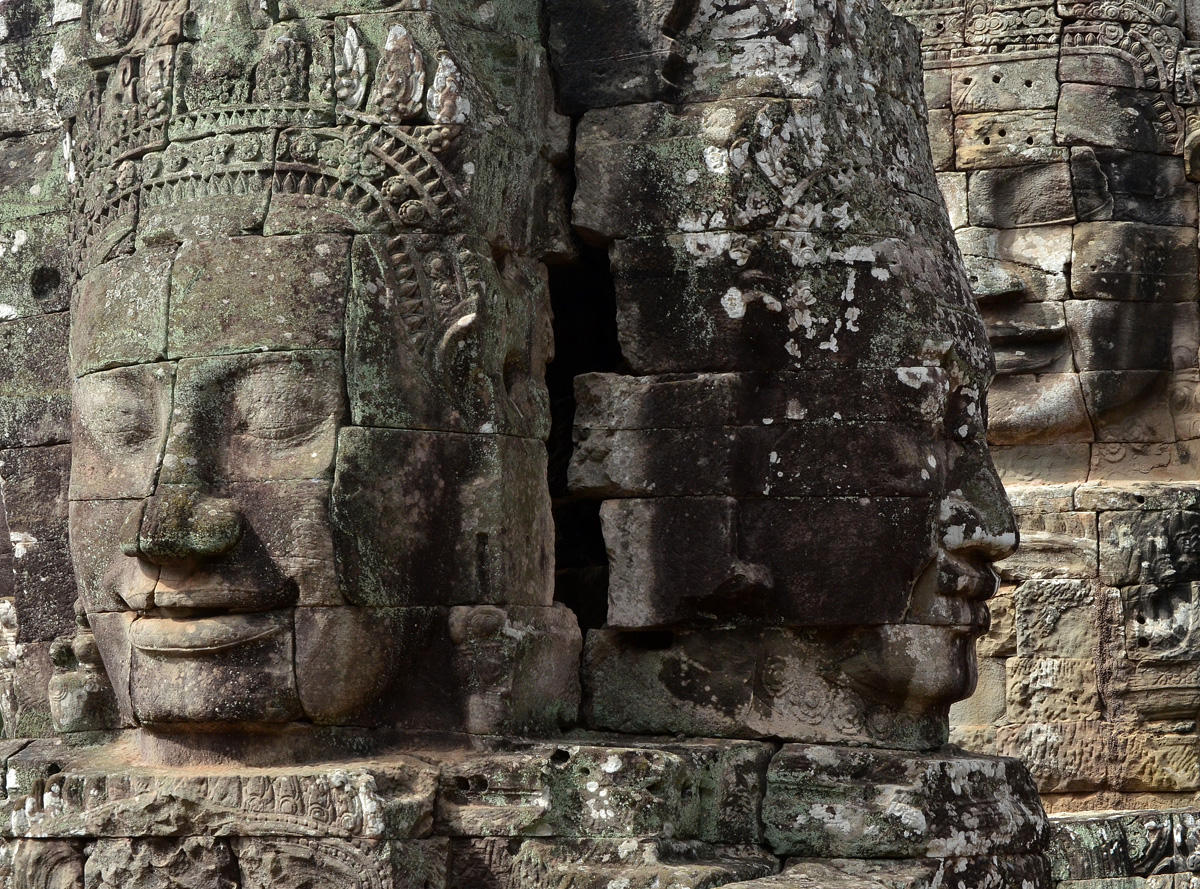 Three stone faces at Bayon Temple