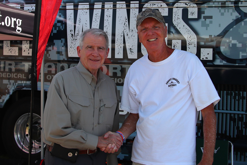 With Col. Oliver North