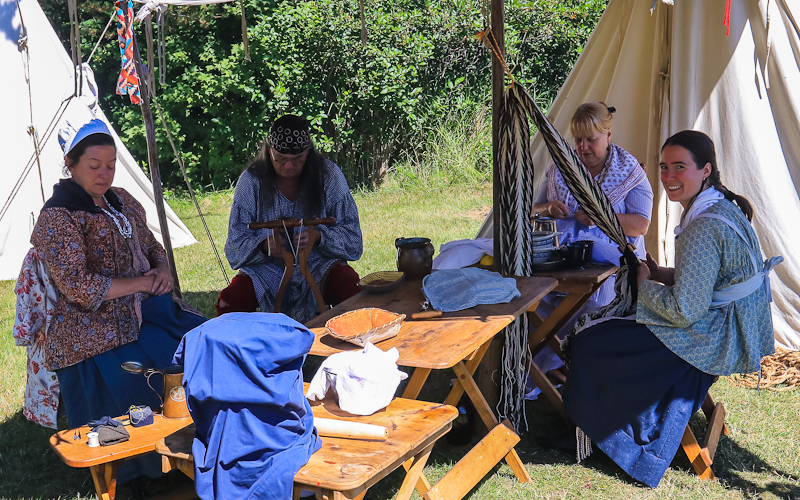 Weaving a sash in the Historic Encampment in Grand Portage National Monument