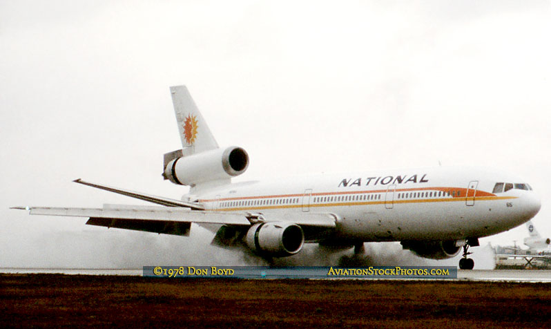 1978 - National Airlines DC10-10 N66NA reversing thrust on wet runway 9L at Miami International Airport