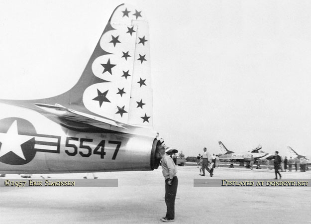 1957 - Erik Simonsens younger brother Alan peering into a Thunderbird T-33A exhaust nozzle at MCAS Miami Masters Field Air Show