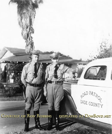 Date TBD - Charles Burton Robbins Sr and an unidentified officer