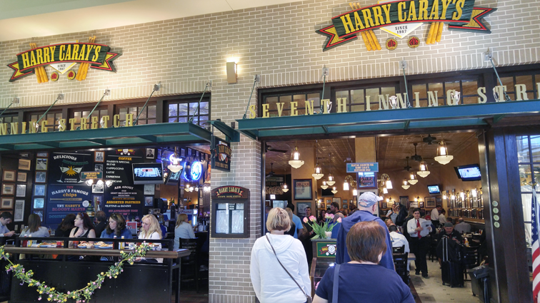 May 2016 - Karen waiting with me for seating at Harry Carays Seventh Inning Stretch restaurant at Chicago Midway Airport
