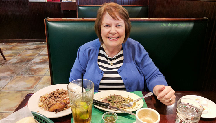 February 2017 - Karen dining on a late lunch of great churrasco, plantains and rice at Molinas Ranch Restaurant in Hialeah