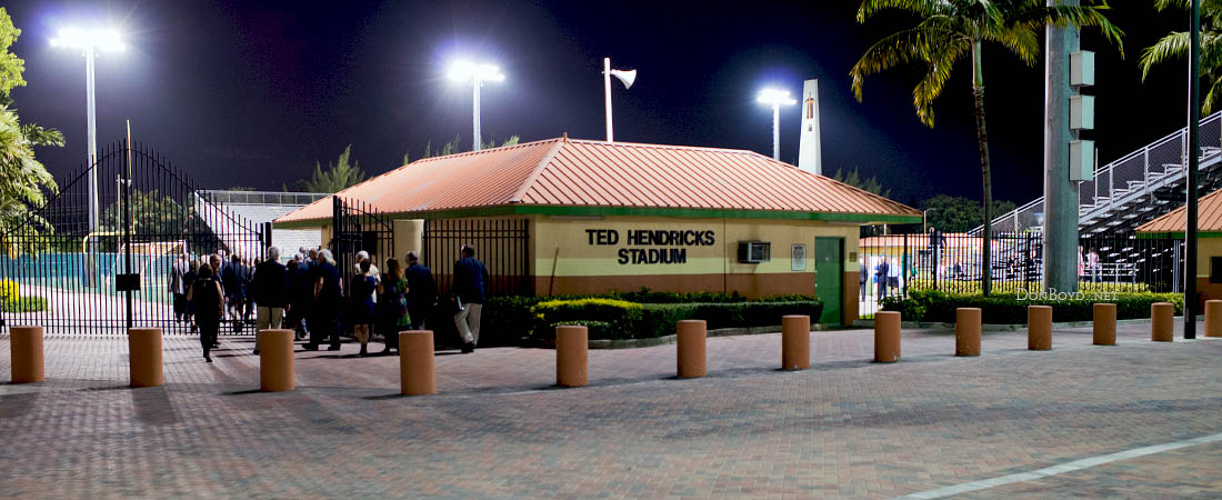 Hialeah High School Class of 1965 50-Year Reunion attendees going to Ted Hendricks Stadium for a group photo in the stands