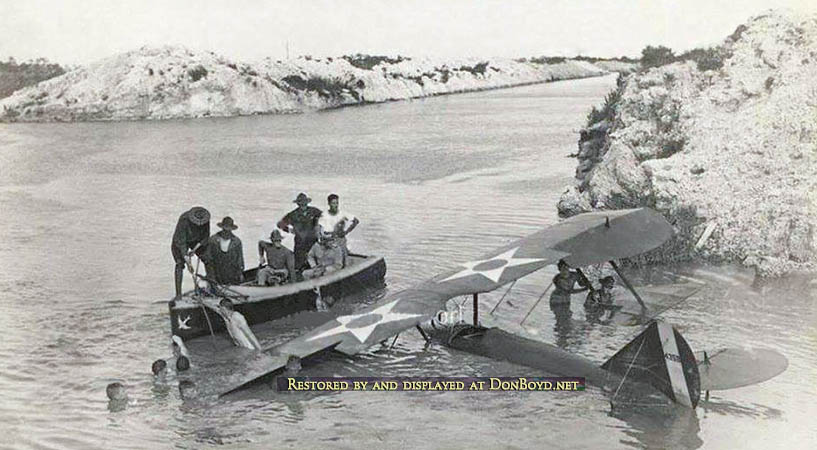 1920s - U. S. Navy bi-plane in the newly dug Miami Canal near Curtiss Airfield in Hialeah on the other side of the canal