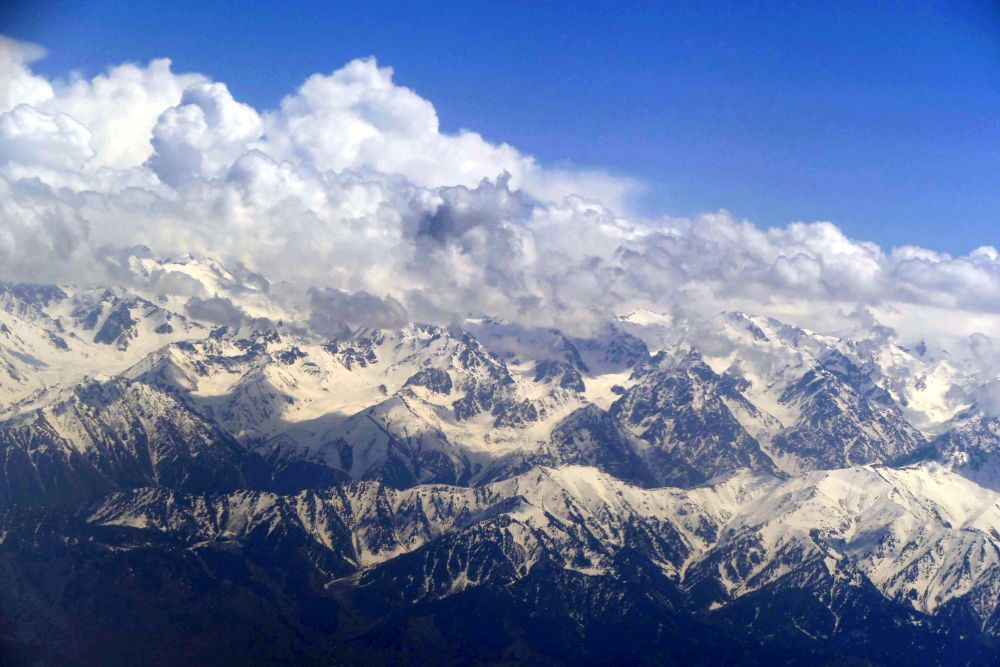 Flying over the Tian Shan mountain range from Almaty, Kazakhstan to Ashgabat, Turkmenistan