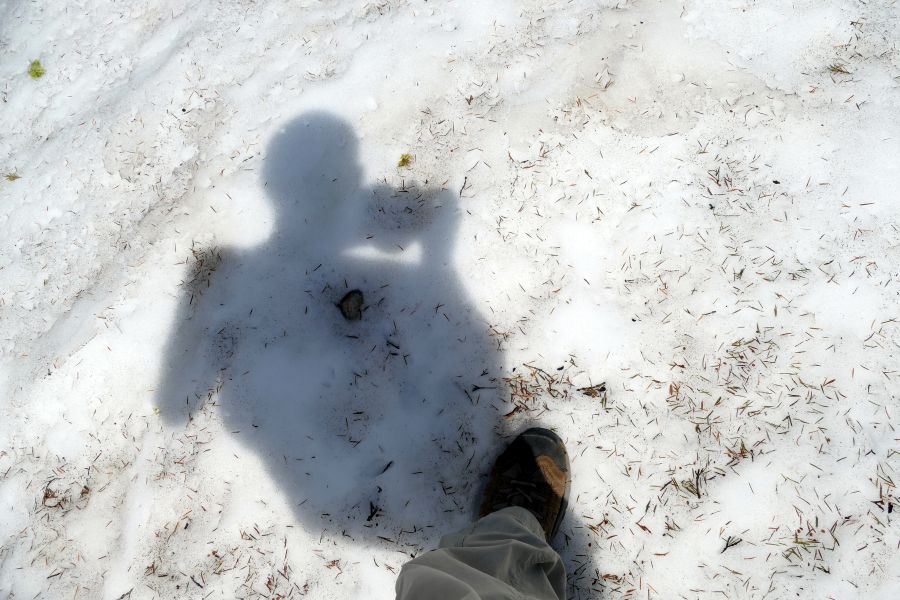 Standing in the snow at Lake Helen