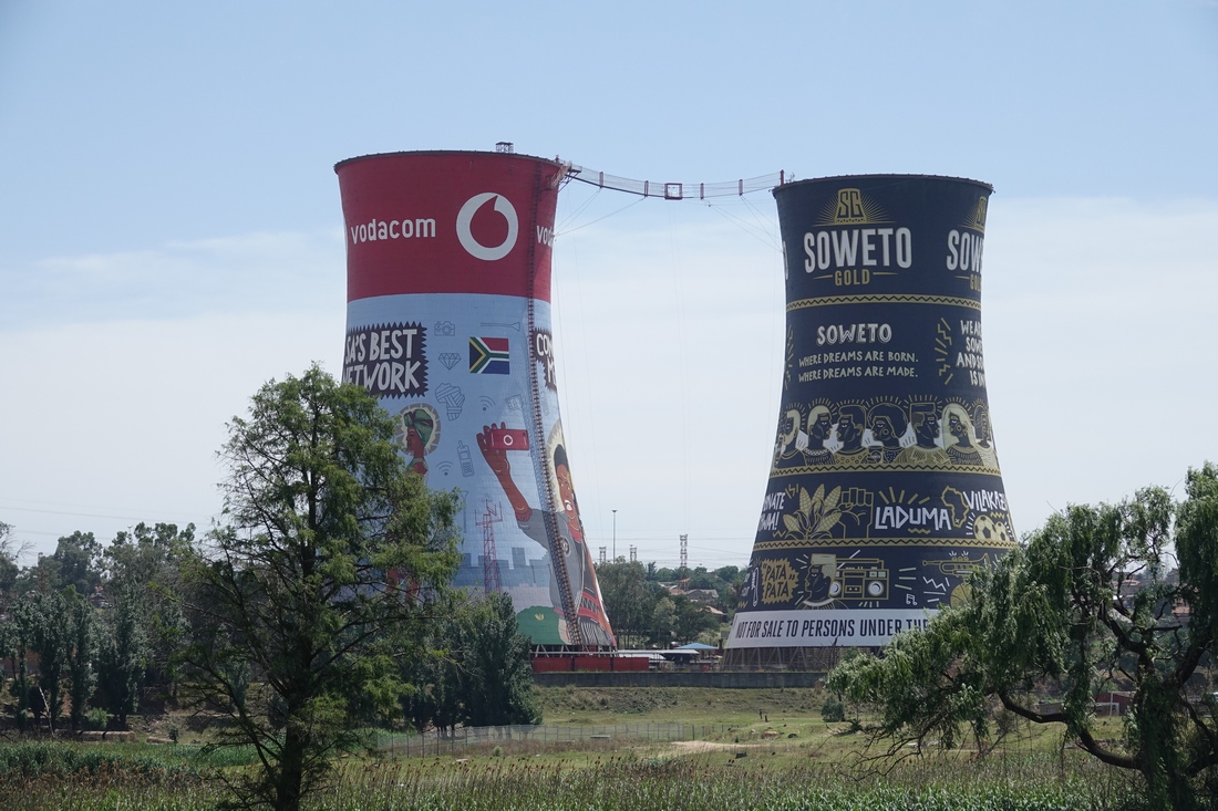 These were the cooling towers of the original Orlando Power Station.  They are now part of a 330 bungee jump.