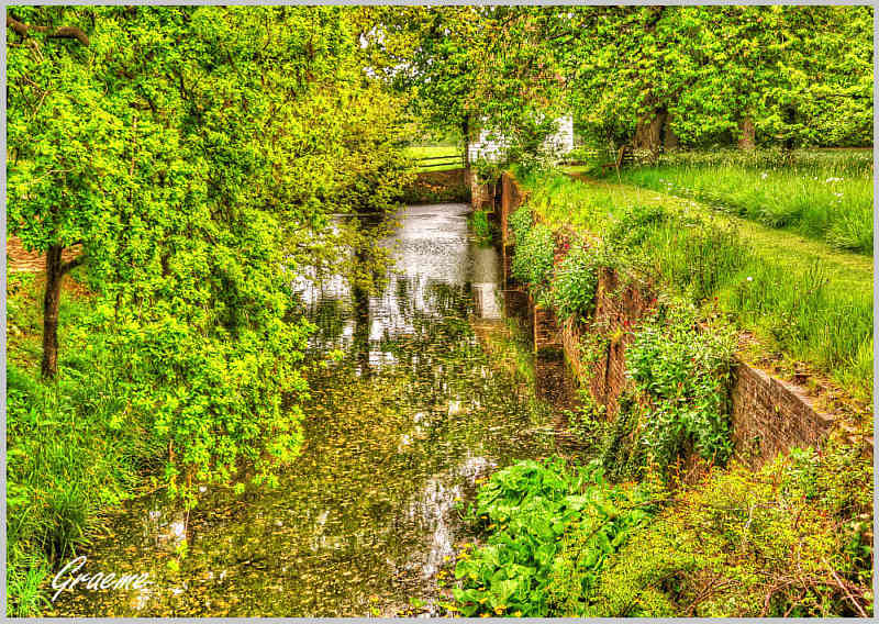 Looking Out of the Boat House to the Moat