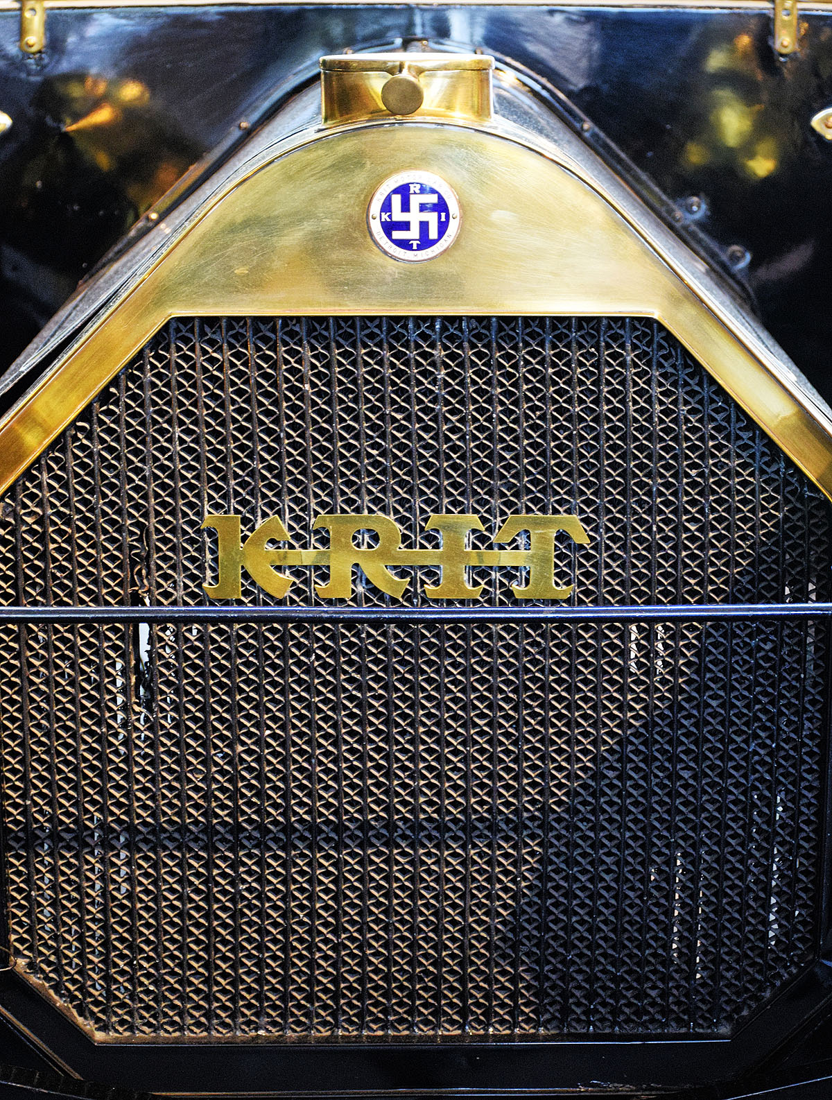 The leading edge of a 1913 K-R-I-T KT 5-passenger touring car
