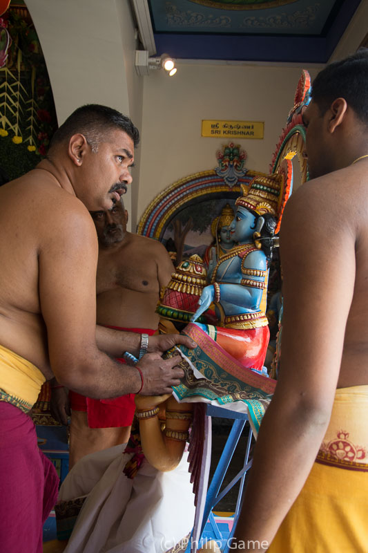 Hindu priests at Sri Mariammam Temple prepare for a ceremony