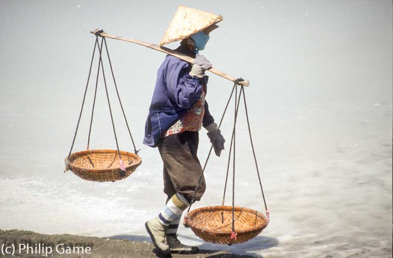 Harvesting sea salt at Cam Ranh Bay