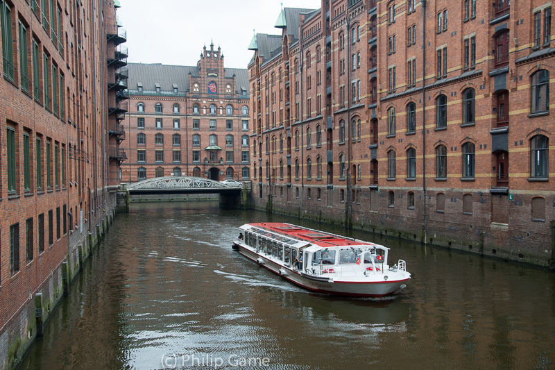 Canals lined with 1920s brick warehouses define the Speicherstadt quarter of Hamburg