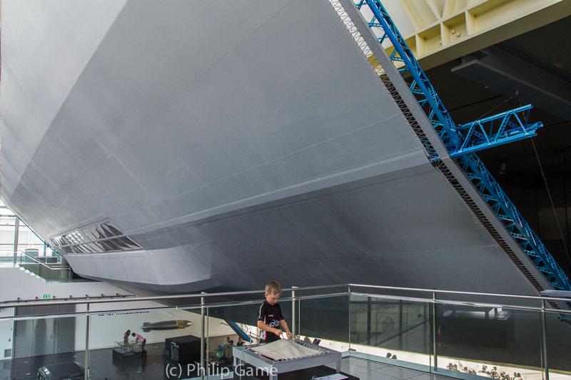 A boy plays at a table in the Zeppelin Museum...