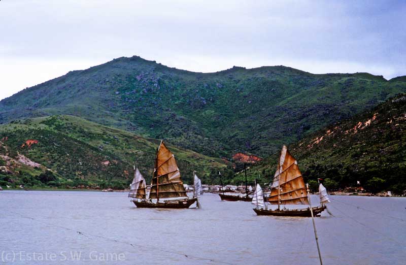 Chinese junks sailing between Hong Kong and Macau