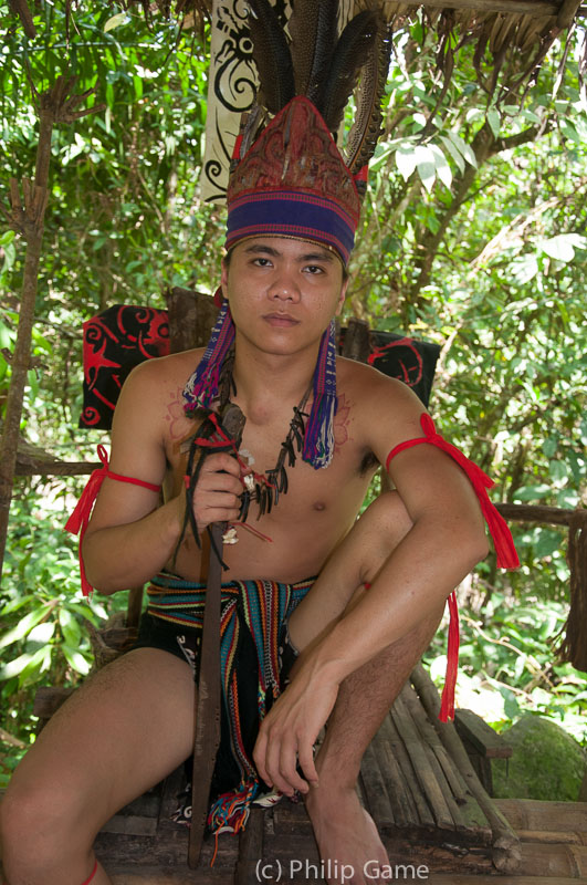 Man dressed in Lundayeh tribal costume