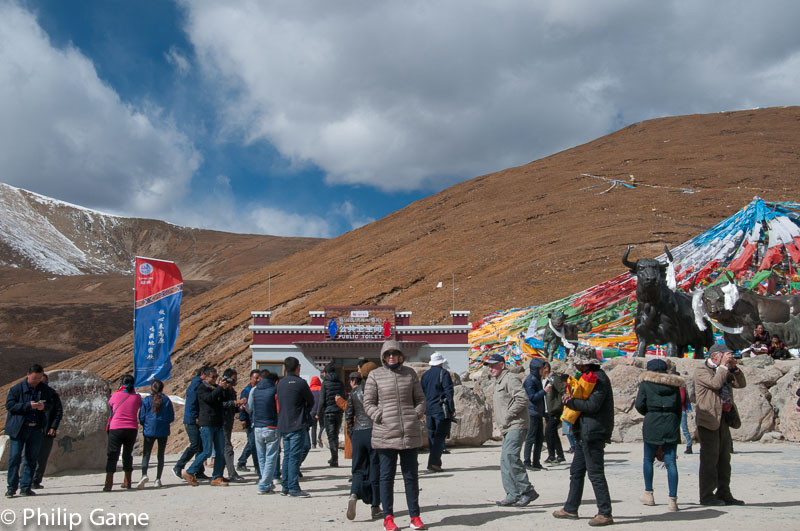 On the road again, heading east out of Lhasa: a rest halt at the 5000-metre Mila Pass