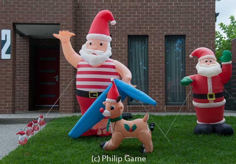 Our neighbours' Inflatable Santas