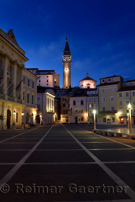 Tartini Square in Piran Slovenia with City Hall, St Georges Parish Church with belfry tower and baptistry, Venetian House at du