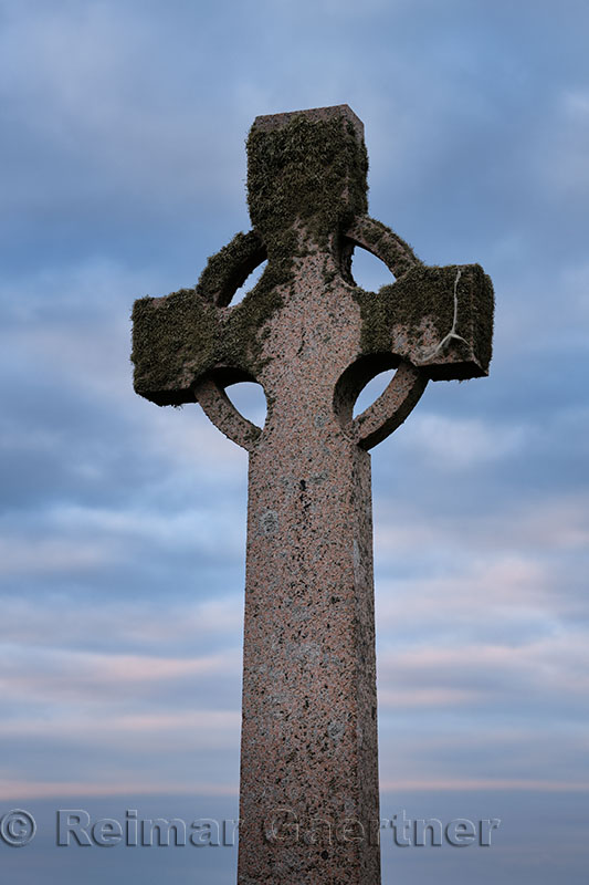 Duchess Cross granite memorial to Elizabeth Duchess of Argyll at dusk on Isle of Iona Inner Hebrides Scotland UK