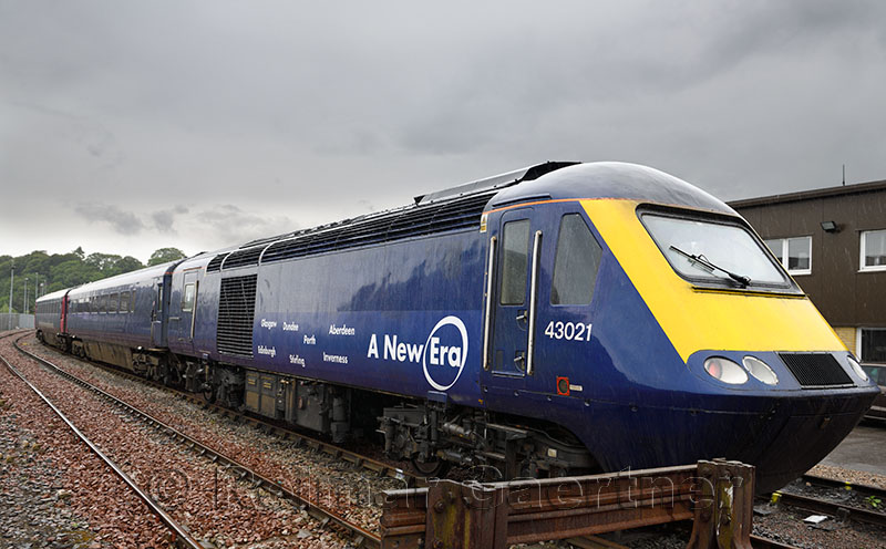 Old train refurbished for A New Era high speed intercity rail service  parked in Inverness yard Scotland UK on rainy cloudy day