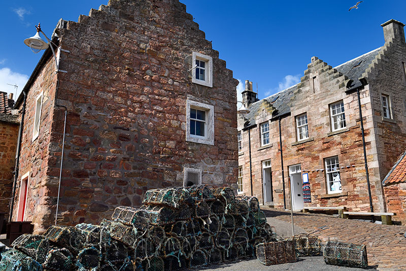 Brodies Grannies restaurant and stone houses and lobster traps in the fishing village of Crail Fife Scotland UK