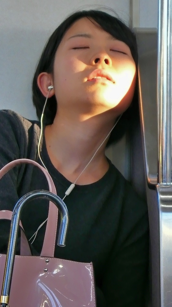 Pretty Young Girl Sleeping On Metro