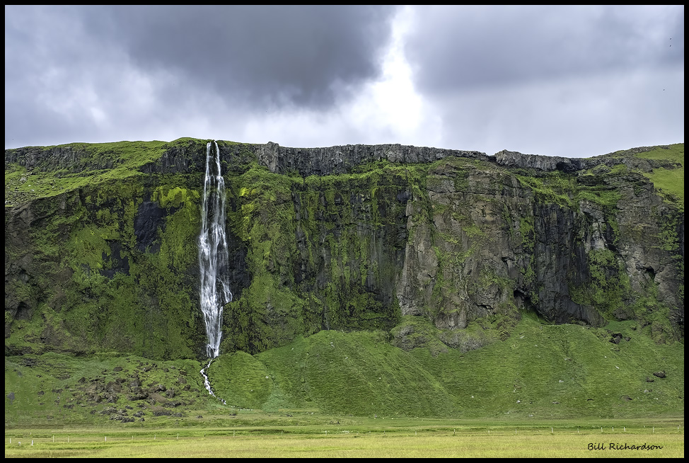 waterfall over sheep pasture.jpg