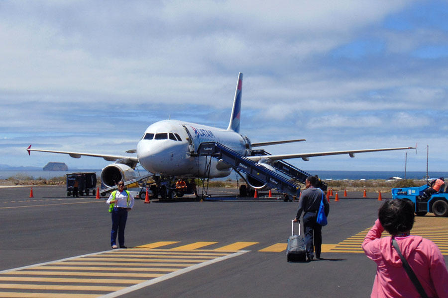 Boarding our flight out of Baltra and the Galapagos